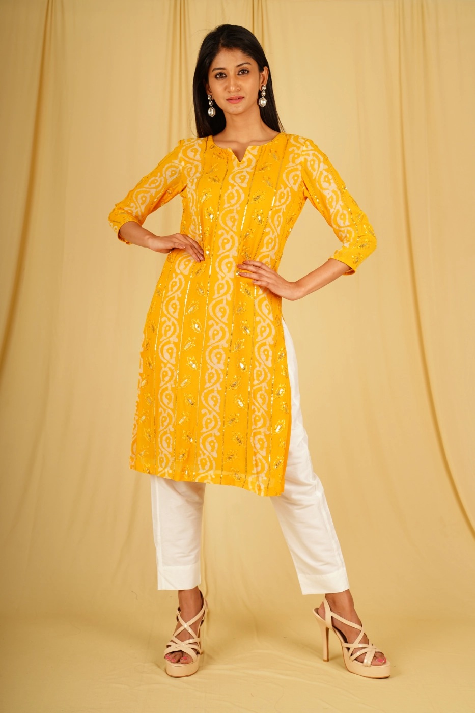 mustard-yellow-georgette-straight-cut-kurta-top-paired-with-white-lycra-cotton-ankle-length-pants-m?uid=1674832331