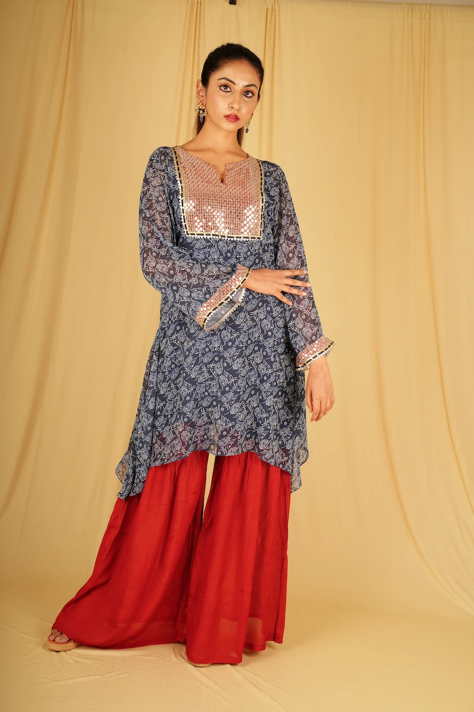 indigo-blue-and-white-floral-printed-chiffon-kurta-with-maroon-sequin-work-yolk-and-maroon-sharara-m?uid=1674969391