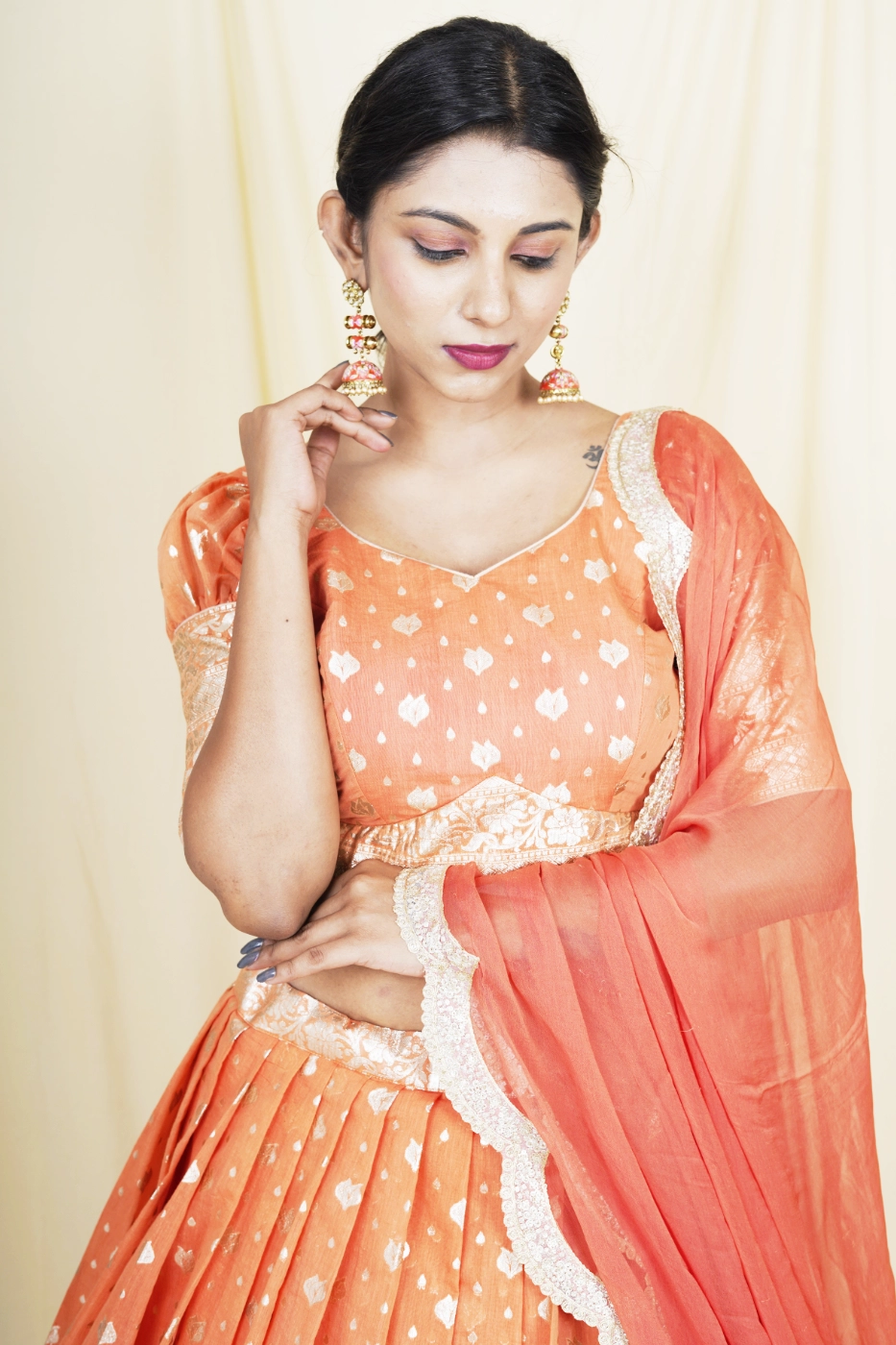 brick-orange-chanderi-lehenga-with-matching-blouse-and-dupatta-s?uid=1675051785