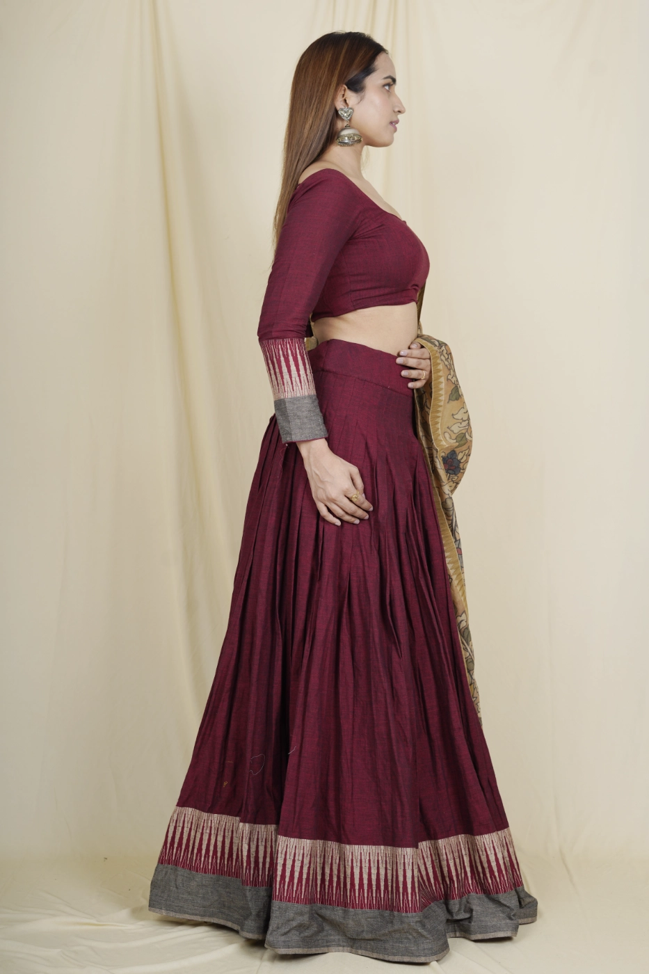 maroon-mangalagiri-cotton-lehenga-with-brown-temple-border-paired-with-matching-blouse-and-brown-pen-kalamkari-dupatta-s?uid=1675052096