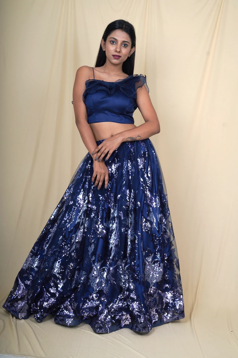 navy-blue-soft-net-with-all-over-sequin-embroidery-and-organza-one-shoulder-ruffle-top-l?uid=1676378570