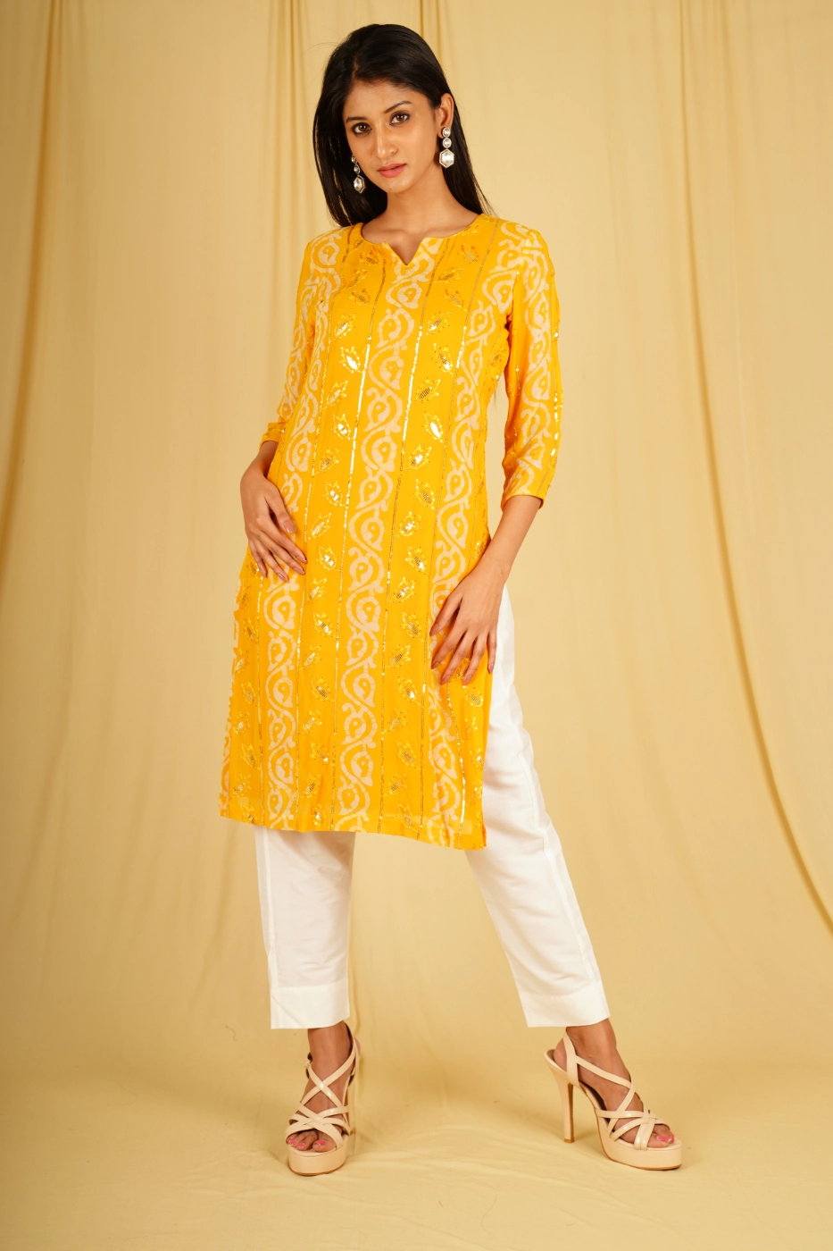 mustard-yellow-georgette-straight-cut-kurta-top-paired-with-white-lycra-cotton-ankle-length-pants-m?uid=1674832331