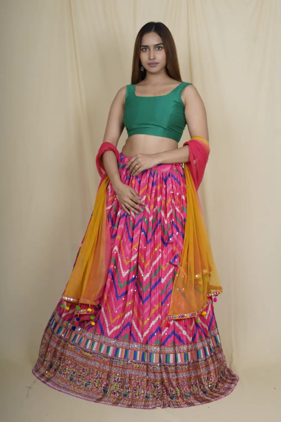 pink-crushed-lehenga-with-heavy-printed-border-and-contrast-green-blouse-and-double-shade-dupatta-s?uid=1675053368