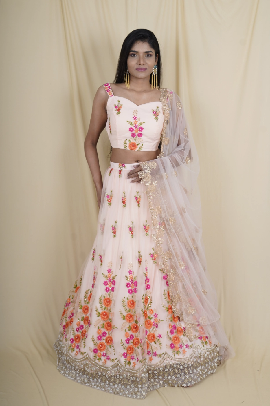 light-coral-soft-net-lehenga-with-floral-embroidery-and-spaghetti-strap-crop-top-and-matching-dupatta-m?uid=1675053498