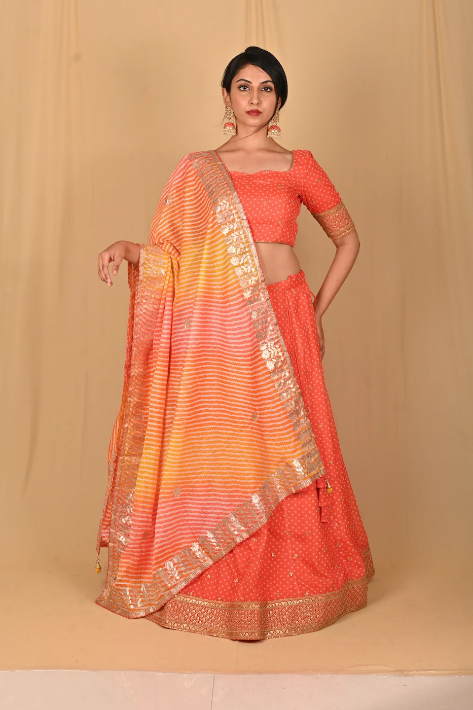 tangerine-orange-bandini-print-organza-lehenga-set-and-leheriya-dupatta-m?uid=1676353225