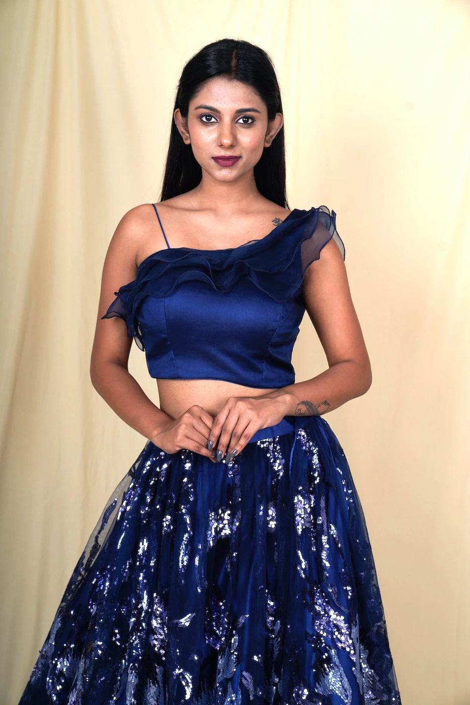 navy-blue-soft-net-with-all-over-sequin-embroidery-and-organza-one-shoulder-ruffle-top-l?uid=1676378570